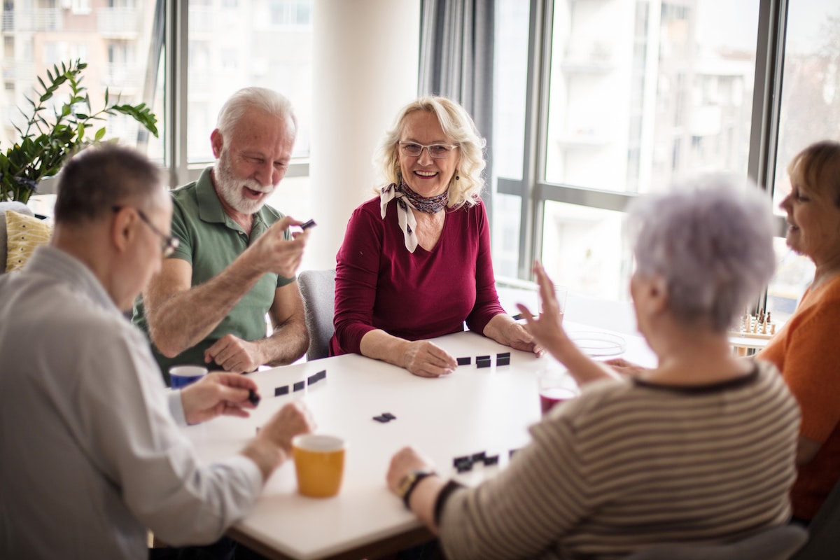 Group of Seniors Smiling and Playing a Game_The Grove on Forest Lane