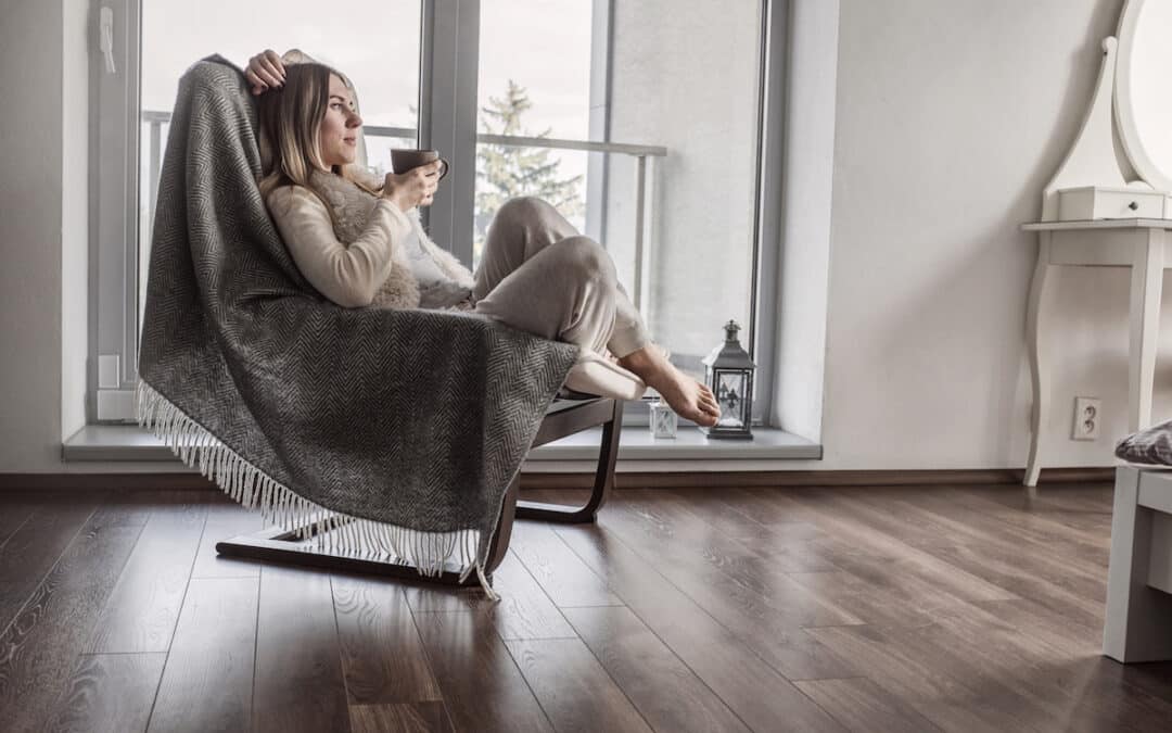 Woman Drinking Coffee Relaxes in Chair_The Grove on Forest Lane